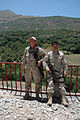 U.S. Army Sergeant First Class Charles Holt (left) and Kurdish Peshmerga “Special Forces" Sergeant (SGT) Karzan Girdy, pose for a photograph outside of Erbil. SFC Holt carries a M16A2 rifle and SGT Girdy is armed with a MP5A3 sub-machine gun.