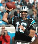 A picture of Vinny Testaverde while throwing a football.