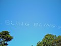 Sky writing by airplane