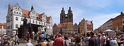 Market square, with ancient town hall, statue of Martin Luther and Stadtkirche