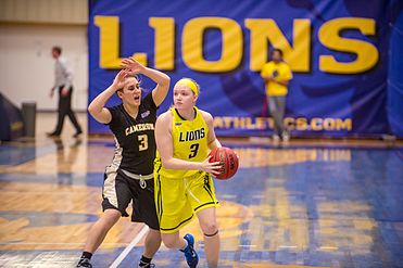 The Aggies women's basketball team in action against the Texas A&M–Commerce Lions in 2015