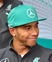 a photo of Lewis Hamilton wearing a hat