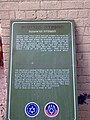 Plaque in front of the former British head­quar­ters, which was then also used by the IAF