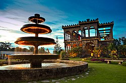 View of The Ruins of the Mariano Ledesma Lacson Mansion, Talisay City at dusk