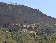 View of the old monastery of the Holy Archangels (Pammegiston Taxiarchon) established by Saint Leontios, as seen from where today lies the monastery of Pammegiston Taxiarchon.