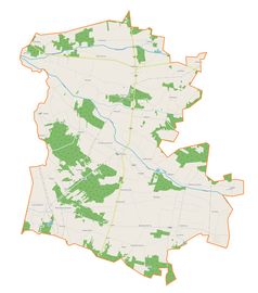 Mapa konturowa gminy Drużbice, po lewej nieco na dole znajduje się punkt z opisem „Rożniatowice”