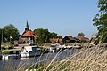 Links gemaal Schager Kogge, rechts de Turfschuren op de Westfriese dijk te Kolhorn.