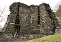 Dun Telve. De twee verticale reeksen van openingen (wall voids) aan de binnenzijde zijn zichtbaar, evenals de dubbele wand van de muur.