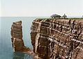 Photochromdruck des „Hengst“ an der Nordspitze von Helgoland (zwischen 1890 und 1905, Fotograf unbekannt)