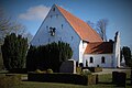 Rinkenæs Gamle Kirke ligger på et bakkedrag 4 km, uden for Rinkenæs.