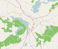 Mapa konturowa Szczecinka, blisko górnej krawiędzi po lewej znajduje się punkt z opisem „Brzostowo”