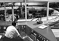 HD.6B.438 - General view of the Cosmotron from the main control console. Equipment in the center of the ring is mainly vacuum gear. (Personnel - E. Maher). c. 1952