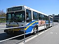 An older high-floor articulated bus. (Running route #44)