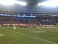 Northern Illinois Huskies (in red) vs South Florida Bulls (in white)