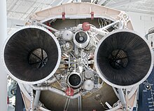 Bottom of two rocket nozzels and a partial view of the engines' pipes and machinery