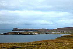 Sandur on the Island of Sandoy - view from the bay Sandsvágur in the Southeast