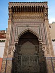 The monumental ornate wall fountain in the southeast courtyard