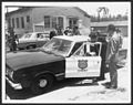 Old patrol car in the 1960s, with Puerto Rico Governor Roberto Sánchez Vilella.