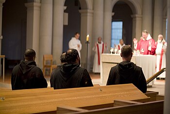 Priest presiding at the Eucharistic prayer at St. Joseph Benedictine Abbey