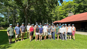 People posing for an outdoor group photo